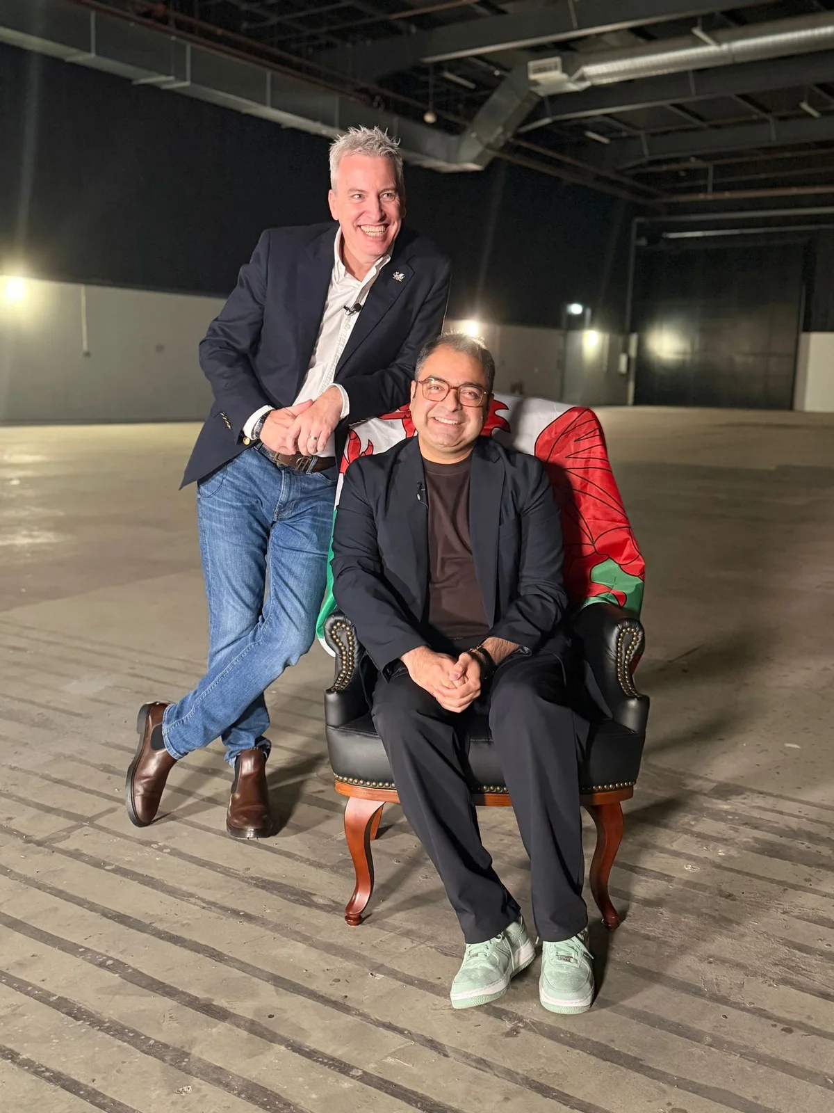 Mark Sweeny with a guest on set